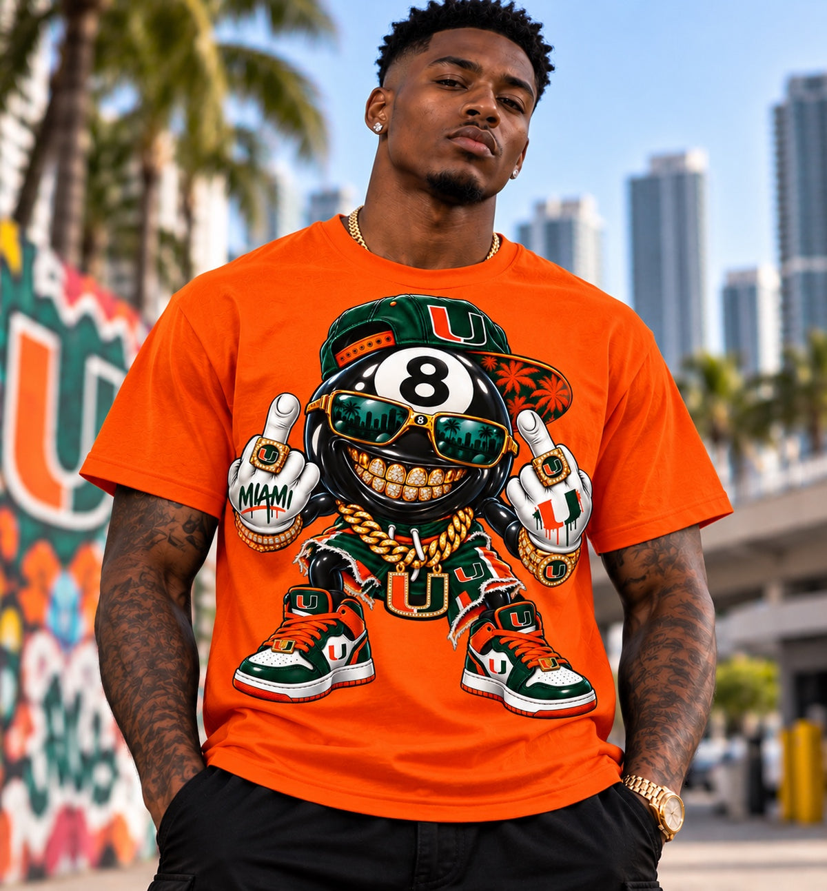 Male model wearing an orange University of Miami 8 Ball graphic T-shirt