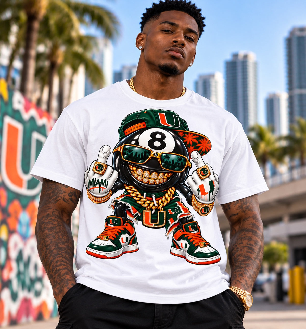 White University of Miami 8 Ball graphic T-shirt with gold grill, green cap and orange-green sneakers